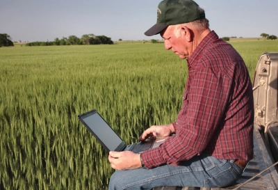 Farmer using rural broadband internet